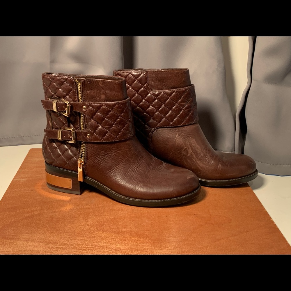 quilted leather boots/gold buckle and heel plate